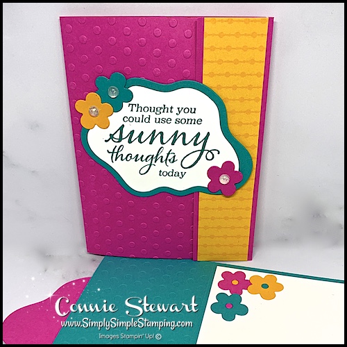 I added flowers in bright cardstock colors to the front of my fun fold card